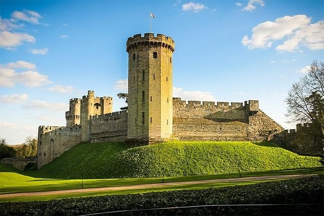 Caesar's Tower standing above the grassed mound at Warwick Castle